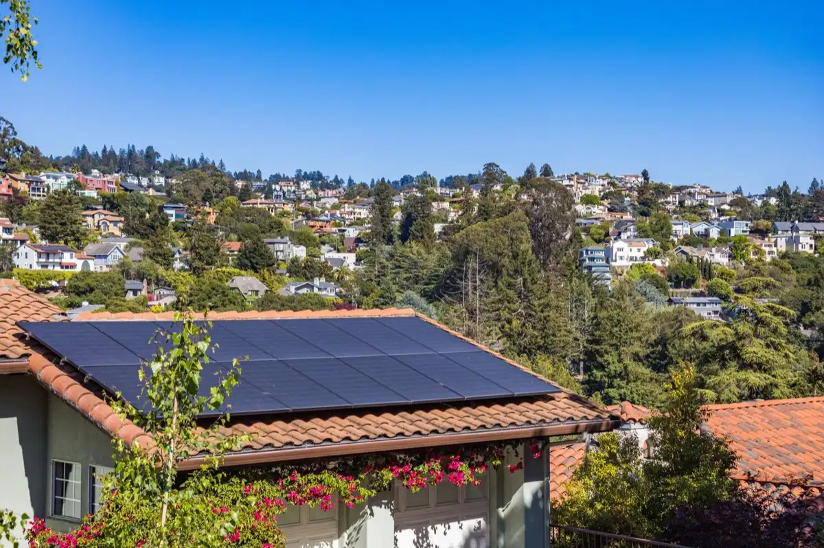 Neighborhood of roofs in Ontario, CA after a storm, where every household is running the same claim process
