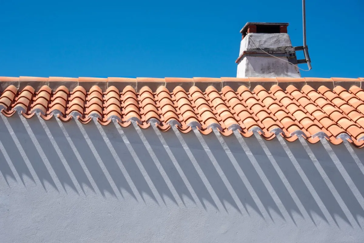 Roof ridge line and chimney on a home in Ontario, CA